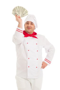 jamón op plaatfan beyaz üniforma giyen dolar tutan adam pişirmek