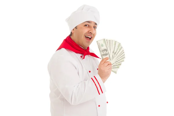 Cocinero hombre celebración fan de dólares vistiendo blanco uniforme — Foto de Stock