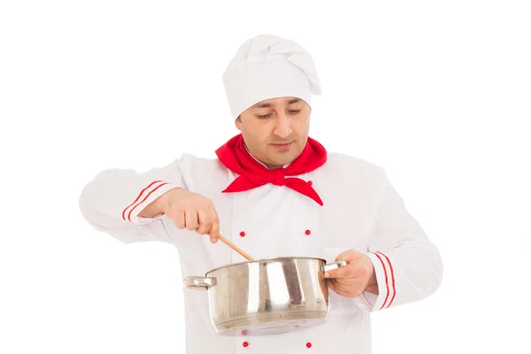 Chef holding saucepan weraing red and white uniform — Stock Photo, Image