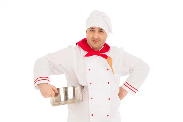 Sonriente chef sosteniendo cacerola weraing uniforme rojo y blanco — Foto de Stock