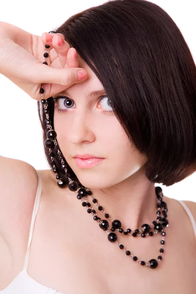 Beautiful girl holding beads — Stock Photo, Image