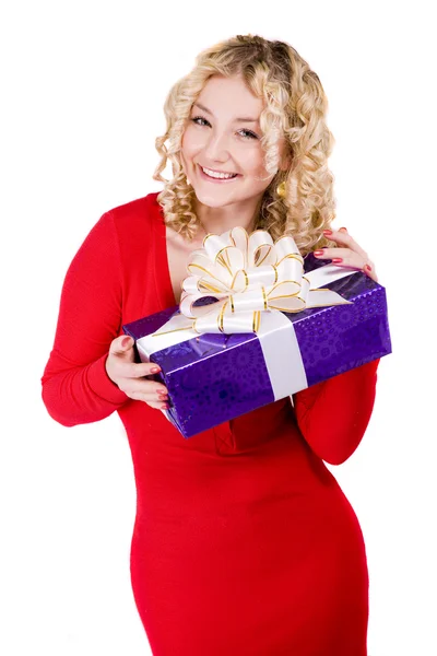 Beautiful blonde curly smiling girl with present — Stock Photo, Image