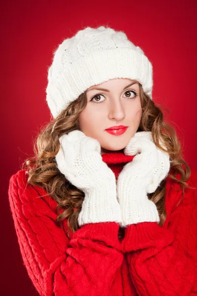 Girl wearing warm hat, mittens and red sweater — Stock Photo, Image