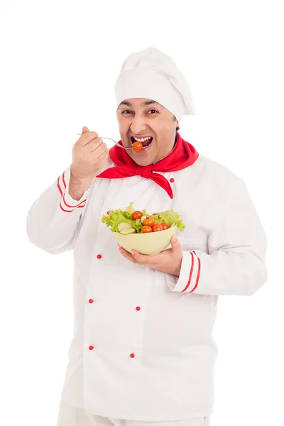 Chef hält Gericht mit Salat und frischem Gemüse — Stockfoto