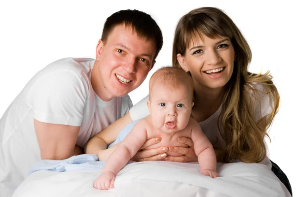 Young mother and father holding their little child — Stock Photo, Image