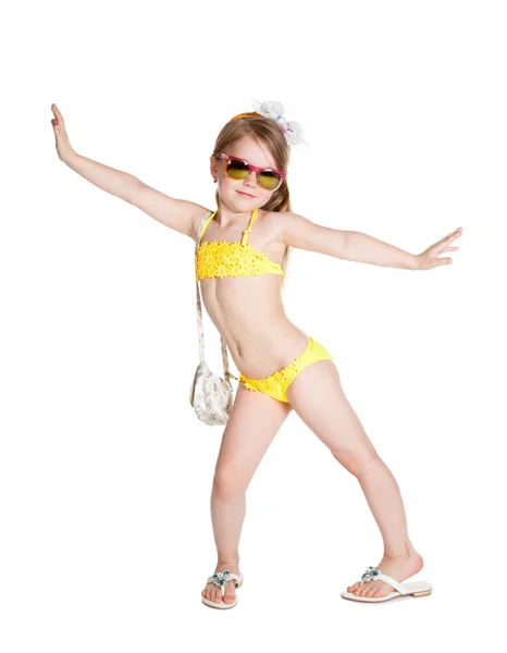 Little blonde girl wearing swimsuit, sun glasses and bag — Stock Photo, Image