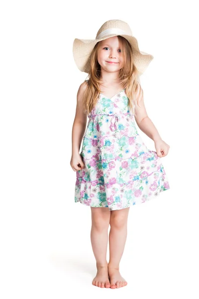 Smiling little blonde girl wearing big white hat and dress — Stock Photo, Image