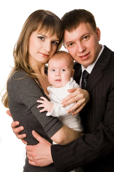 Young mother and father holding their little child — Stock Photo, Image