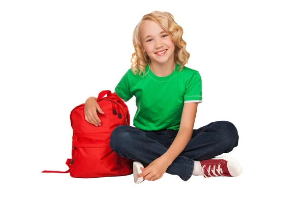 빨간 가방 녹색 티셔츠에 금발의 소녀 스톡 사진