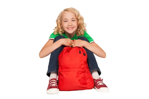 빨간 가방 녹색 티셔츠에 금발의 소녀 스톡 사진
