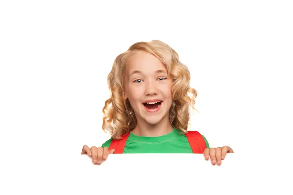 Μικρή ξανθιά κοπέλα πάνω από το κενό billboard Εικόνα Αρχείου
