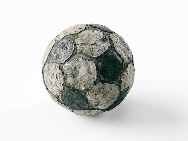 Старый порванный футбольный мяч — стоковое фото
