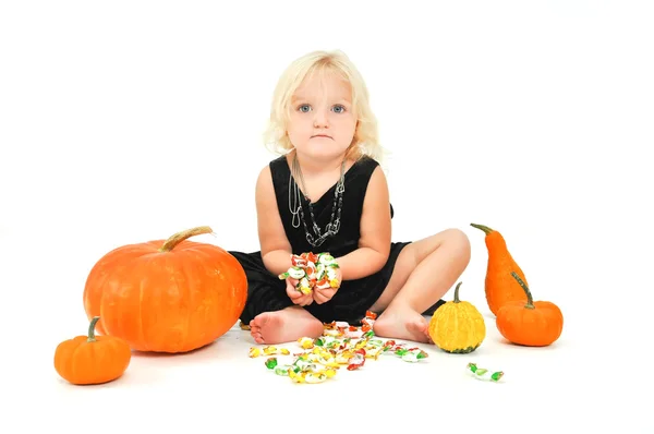 Adorable Baby Girl holding candy Stock Image