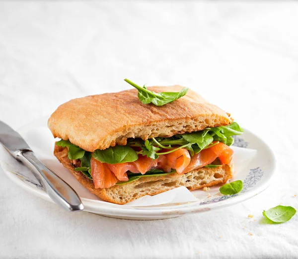 Smoked Salmon Sandwich Fresh Spinach Arugula Leaves Light Background Space — Stock Photo, Image