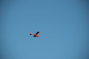 Plane flying on a blue sky