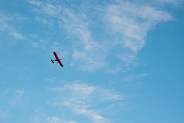 Plane flying on a blue sky