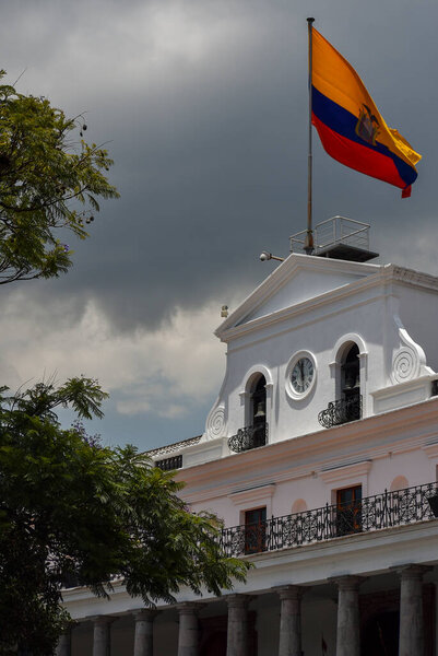 Ecuadorian flag waving over the Quito Presidential Palace