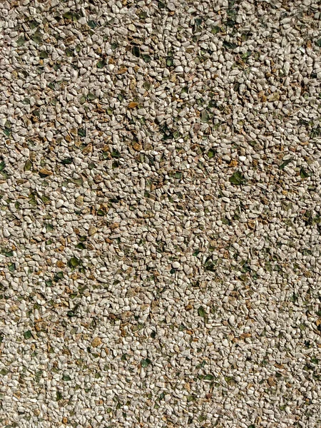 Крупным Планом Стены Покрытой Мелкими Камнями — стоковое фото