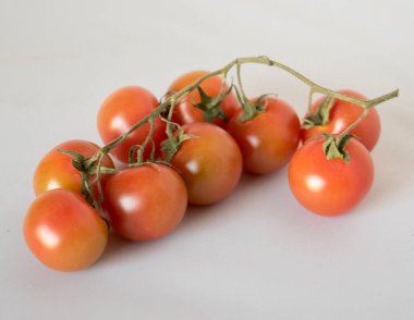 closeup of a bunch of cherry tomatoes