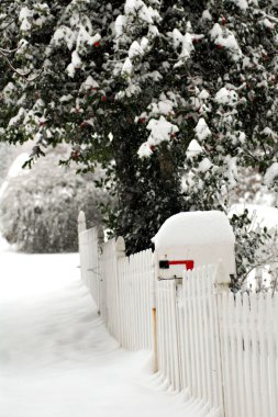 Mailbox Snowed Over On A Frosty Day clipart