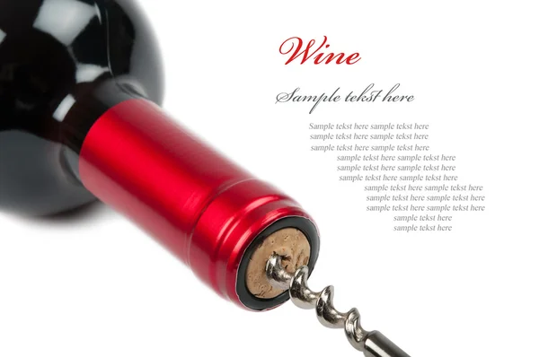 Corkscrew with a bottle of wine — Stock Photo, Image