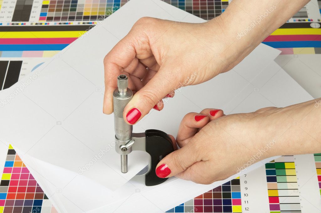 Measurement of thickness of a sheet of paper by a micrometer