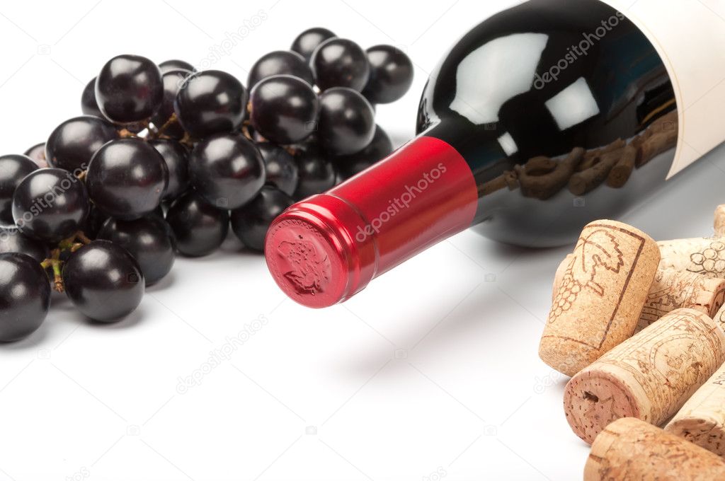 Bottle of red wine on white background