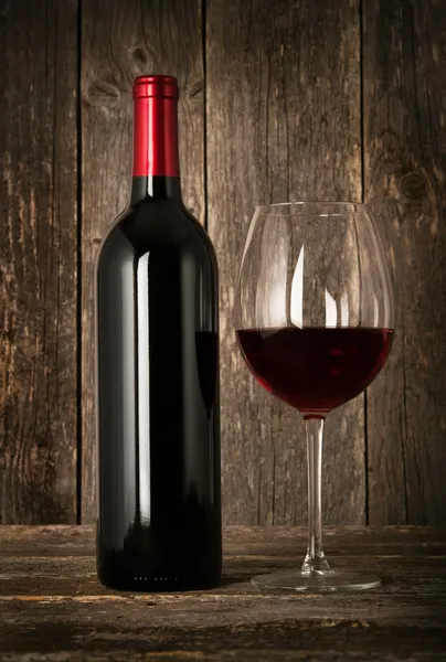 Bottle of red wine and glass — Stock Photo, Image