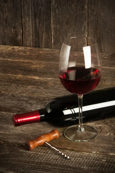 Bottle of red wine and glass — Stock Photo, Image