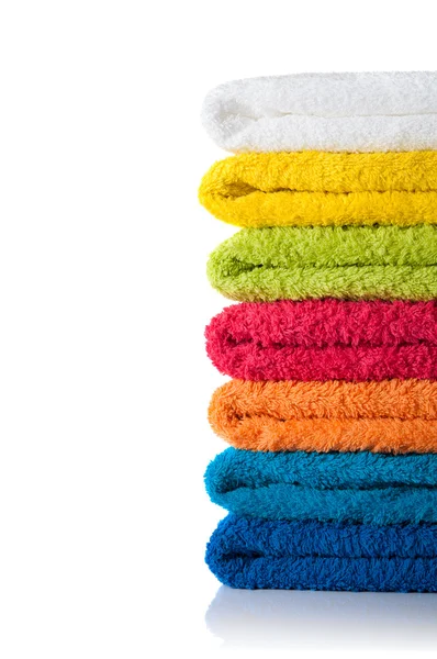 Stack of colorful towels isolated on white background — Stock Photo, Image