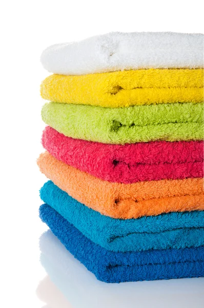 Stack of colorful towels on white — Stock Photo, Image