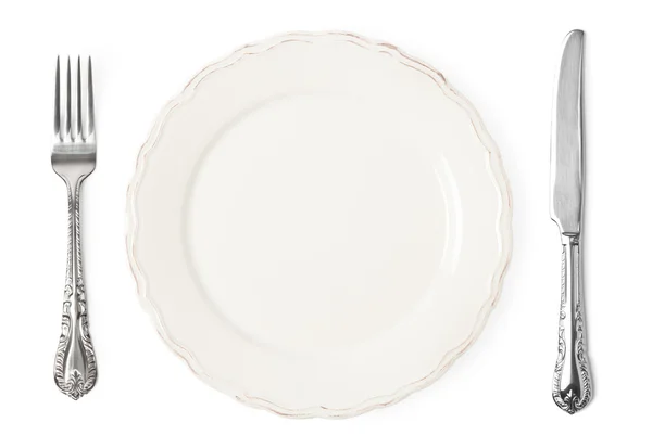 Vintage bıçak, çatal ve beyaz arka plan üzerinde plaka