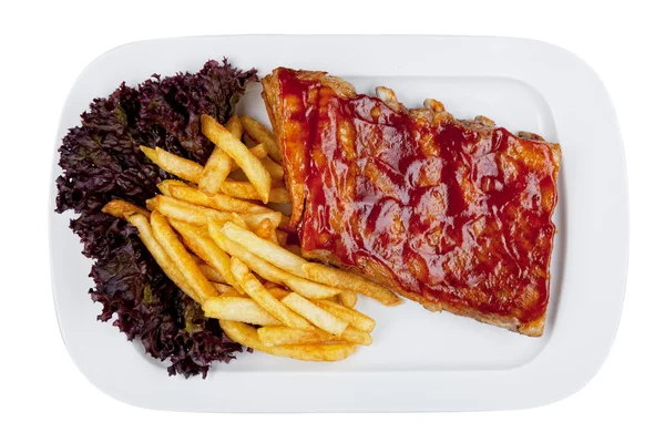 Pork ribs with french fries — Stock Photo, Image