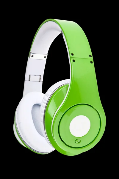 Green headphones isolated on a black background — Stock Photo, Image