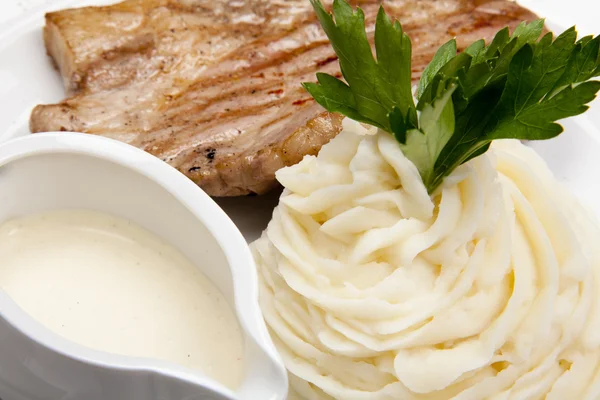 Meat with mashed potatoes and the sauce — Stock Photo, Image