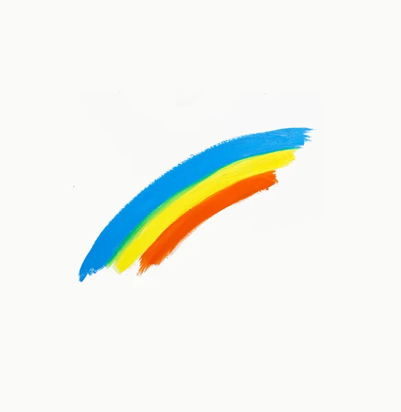 Um arco-íris pintado sobre um fundo branco — Fotografia de Stock