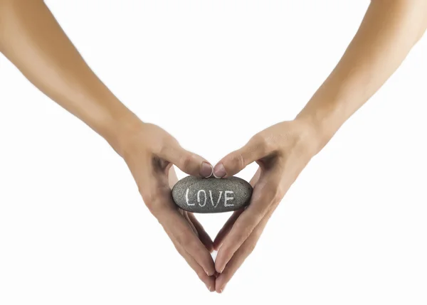 Love rock in hands isoleted on white — Stock Photo, Image