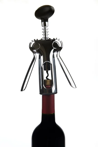 Corkscrew for wine on a white background. — Stock Photo, Image