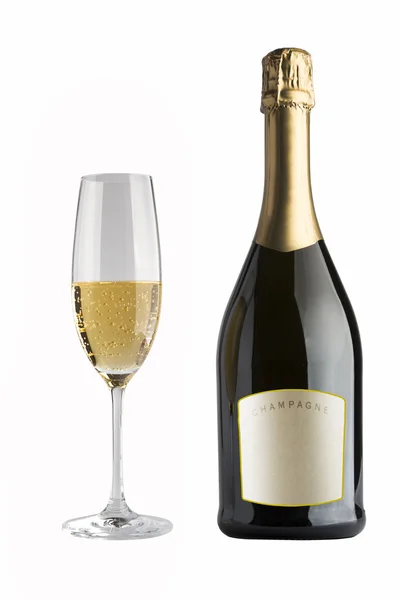 Champagneflaska och champagne glas — Stockfoto