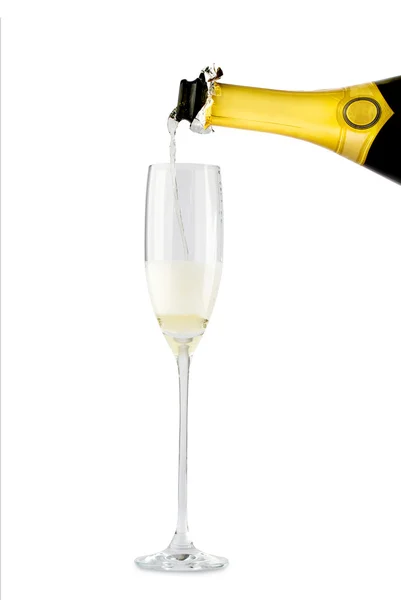 Champagne flow in glass — Stock Photo, Image