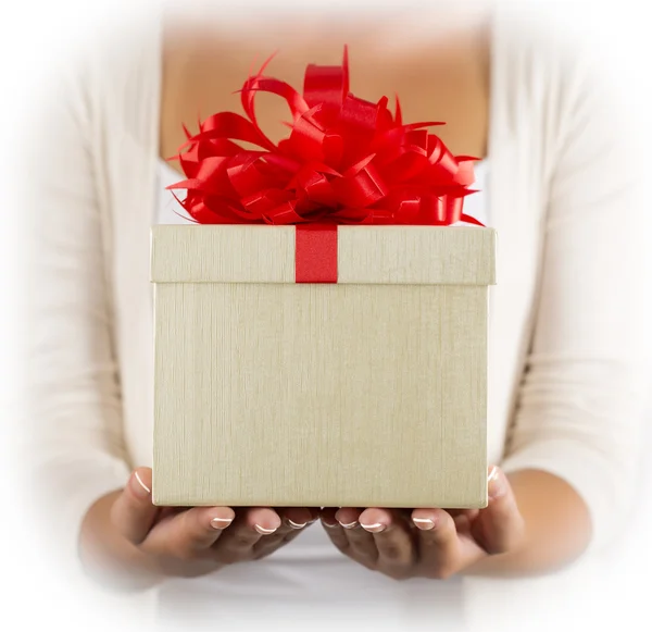 Hands holding gift — Stock Photo, Image