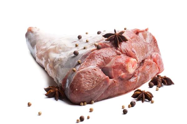 Raw lamb leg with spices — Stock Photo, Image