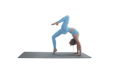 Young athletic attractive woman practicing yoga isolated on whit