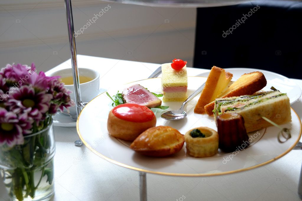Afternoon tea pastries and cakes — Stock Photo © photographjoe 37064507