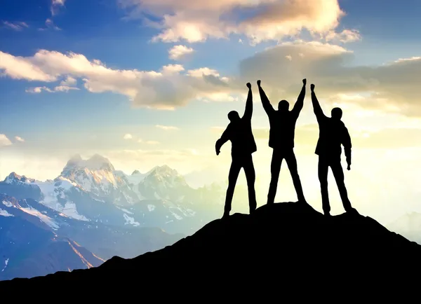 Team on the peak of mountain — Stock Photo, Image