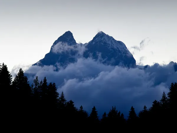 High rock in cloud. — Stock Photo, Image