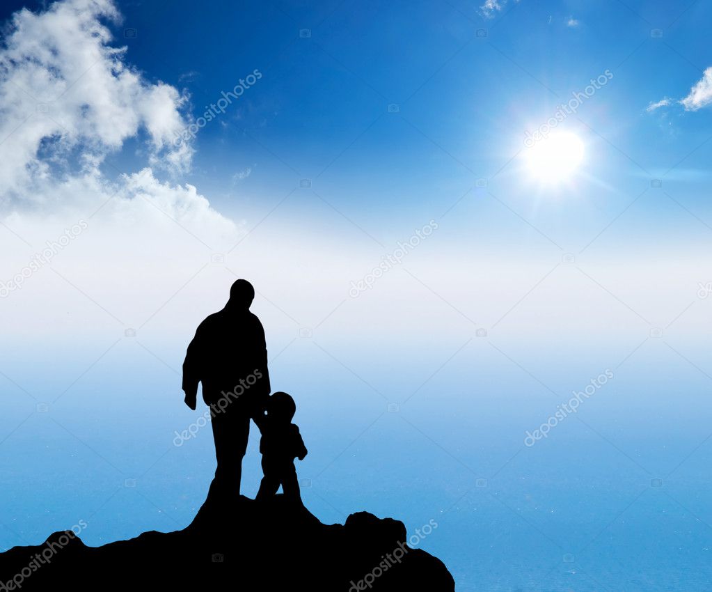 Father and son. Bright sunshine and silhouettes