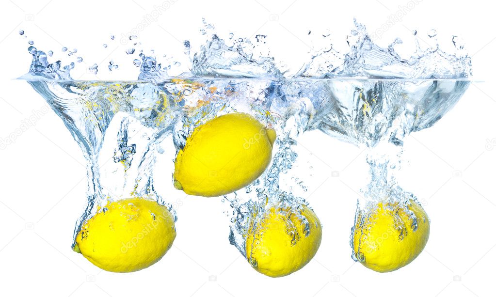 Bright yellow lemons and water splash