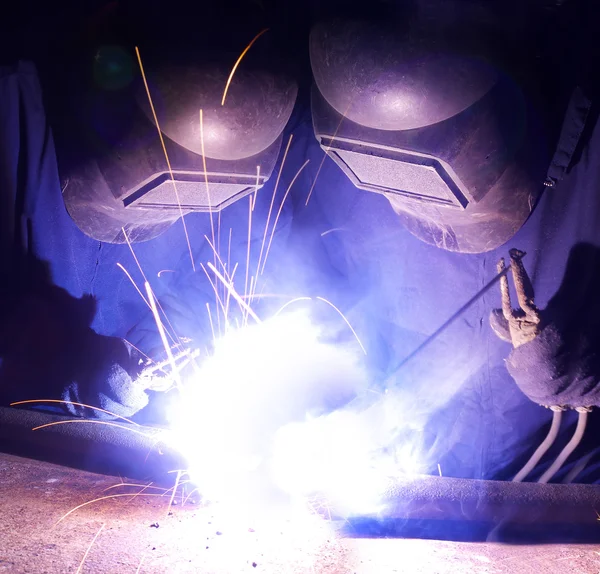 Welders team on factory — Stock Photo, Image