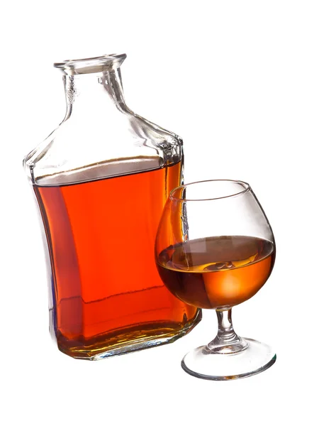 Bottle with glass of brandy — Stock Photo, Image